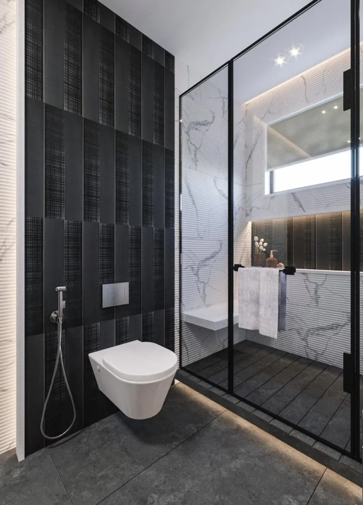 Sleek bathroom with a wall-mounted toilet, dark accent wall, glass shower enclosure, and marble finishes.